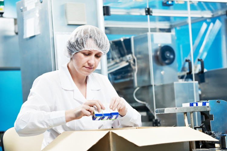 pharmaceutical factory worker at pharmacy industry manufacture